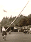 thumbs/Tossing the caber at Braemar.png